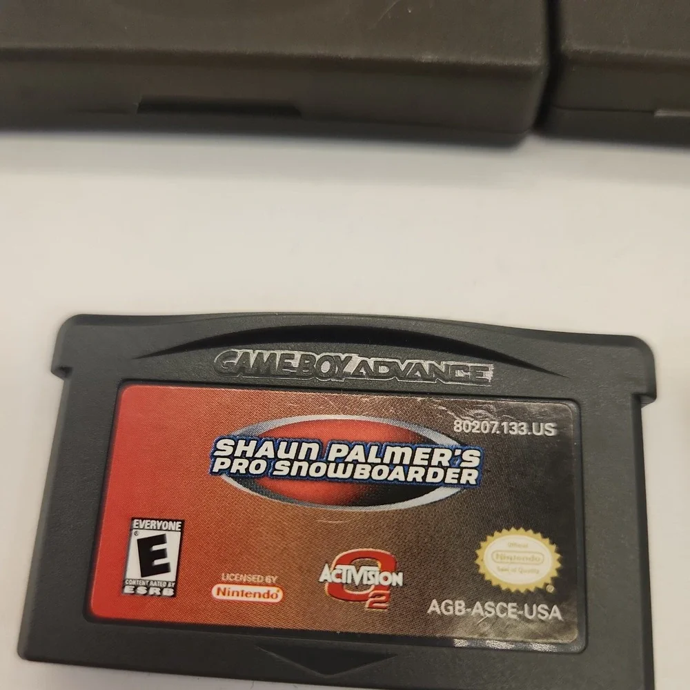 MX 2002 - Nintendo Game Boy Advance SpongeBob Shaun Palmers 2 cases lot of 3